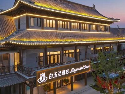 Magnotel Hotel (Liangshan Shuibo East Road Longcheng Plaza)