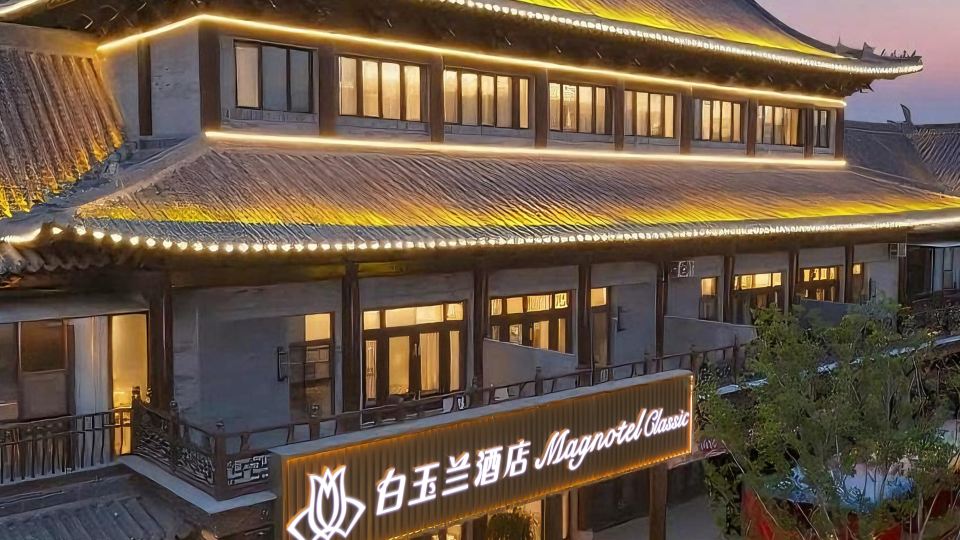 Magnotel Hotel (Liangshan Shuibo East Road Longcheng Plaza)