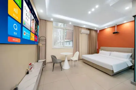 Juzi Movie Hotel (Runan Aijia Xingguang Jewelry City) Отели в г. Жунань
