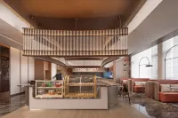 Hilton Garden Inn Zhoukou Chuanhui - Morgenmad