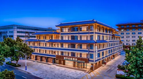 Urban Garden Hotel (Penglai Pavilion Street Dengzhou Road Market) - فطور