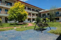 Evening Breeze Courtyard-Style Hotel (Fengning Bashang Grassland Datanzhen) - balcón