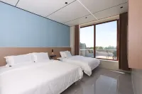 Haishu Xinjv Holiday Homestay - พร้อมอาหารเช้า