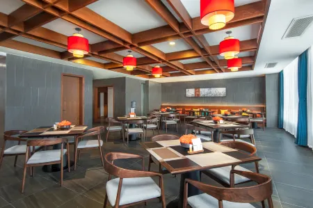 Xinzhou CLEAN HOTEL Отели рядом с достопримечательностью «Xiurong College»