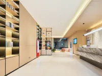 Happy Travel Hotel (Haikou MOVA Commercial square Duty Free) Hotels near Meilan