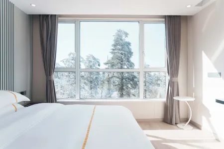 Emeishan Sanhejia Hotel Отели рядом с достопримечательностью «Jiulao Cave»