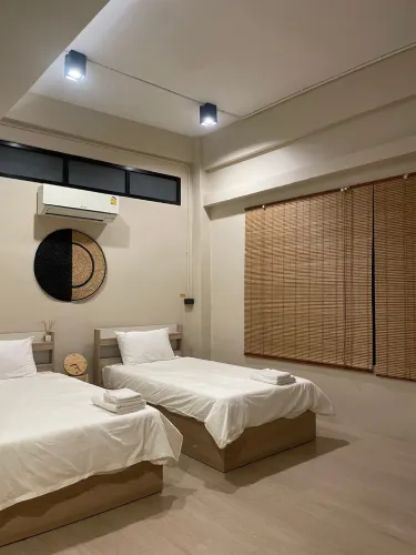 ห้องดีลักซ์ เตียงแฝด พร้อมห้องน้ำในตัว