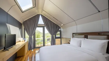 Floral Hotel·Yoyo Valley Homestay Отели рядом с достопримечательностью «Rizhao Coastal National Forest Park»