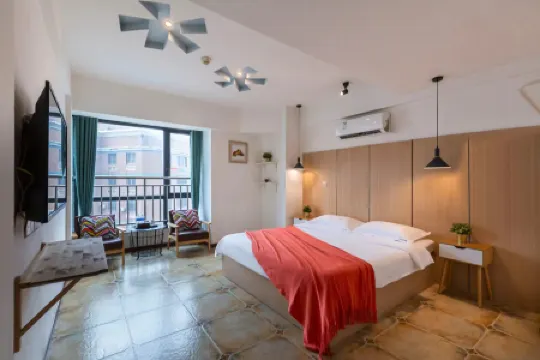 Wiseman Travel Theme Hotel Отели рядом с достопримечательностью «Yangzidao Holiday Club»