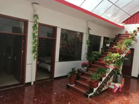 Village yard Отели в г. Цзяочен