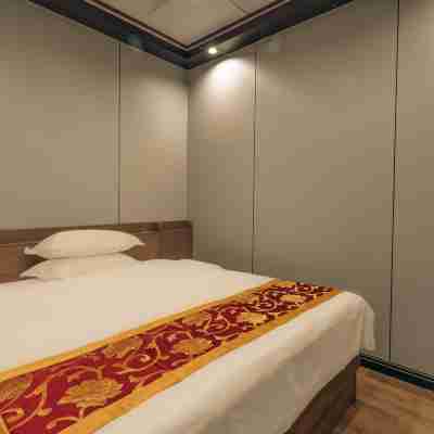 猛哥萬奇酒店（婁底新體育館職業技術學院店） Rooms