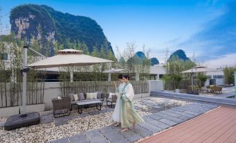 Moshang Landscape Printing Hotel (Guilin Yangshuo Yulong River Branch)