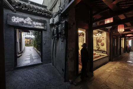 Shiyu Nanshe Hotel Отели рядом с достопримечательностью «Wolong Bridge»