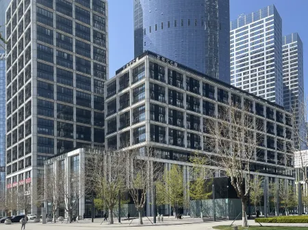 Dalian Xinghai Square Tide Ocean Designer Hotel Отели рядом с достопримечательностью «Department of Engineering Mechanics Dalian University of Technology»