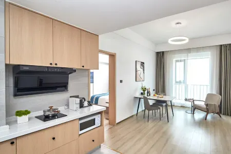 Guanggu International Apartment Отели рядом с достопримечательностью «Shandong University of Science and Technology (Qingdao Campus)»