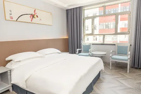 Wanxiang Liya Hotel (Cultural Square) Отели в г. Чугучак