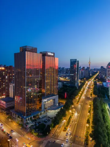 Hilton Harbin Exhibition Center Отели в г. 