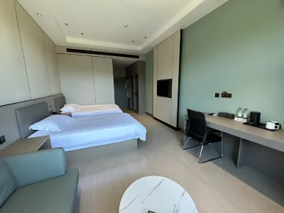哈拉新村阿木勒酒店 메이리쓰 다우르족구 호텔