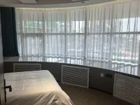 PolttoN Century Hotel (Urumqi Hongshan Park Times Square CCMALL Branch) - Vuoristonäköala