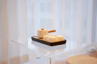 Lansheng Hotel (Xing Yi Jushan Square Mengle City Branch)