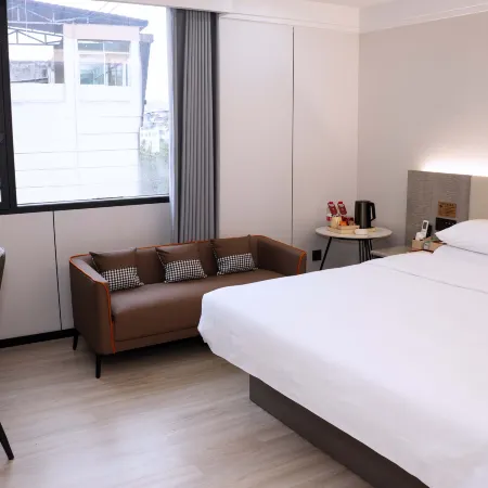 Huaqiao Smart Boutique Hotel (Quannan County Zhanqian Road)