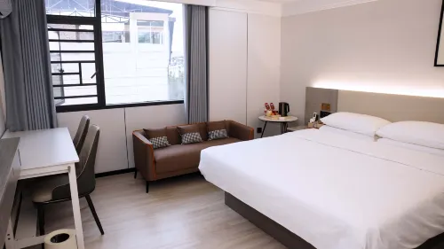 Huaqiao Smart Boutique Hotel (Quannan County Zhanqian Road) - พร้อมWifi