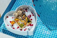 Cloud Dwelling Sky Pool Resort (Xishuangbanna West Shuangjing Xingguang Night Market Branch) - พร้อมอาหารเช้า