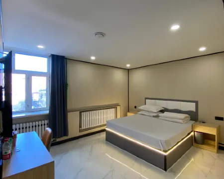 Qiaojia Hotel Hoteles en Nehe