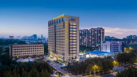Vienna International Hotel (Dongying Wuyue Square Branch) Отели в г. Дуньин