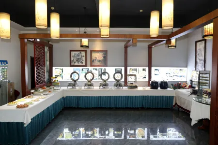 Kangqiao Hotel (Jingyuan Square Branch) Отели рядом с достопримечательностью «Zhonggulou»