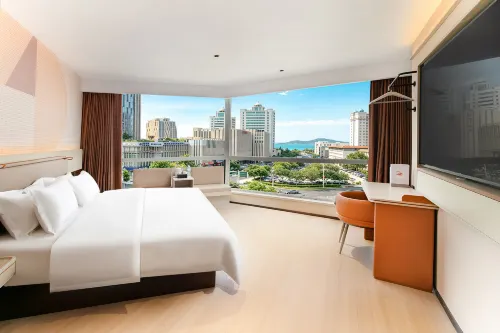EZZI Hotel (Weihai Weigao Plaza Liugong Island) - พร้อมWifi