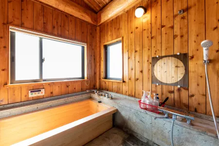 Log House Clover Отели рядом с достопримечательностью «Монт Омуро»