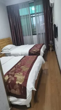 Huaxing Hotel Отели рядом с достопримечательностью «Guocha Village, Huluzhen, Baojing County»