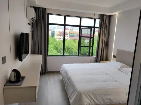 May Smart Hotel (Nanfeng Judu Avenue) Отели рядом с достопримечательностью «Wanfu Ancient Temple»