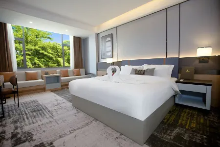 Menglian Ping'an Hotel Отели в г. Менлянь