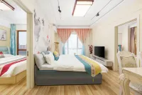 Yuecheng Boutique Business Apartment (Dalian North Station Huanan Square Subway Station) - مطابخ