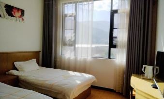 Yongsheng Chenghai Shili Biantun Hotel