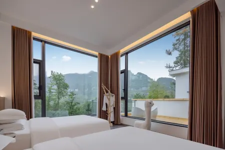 Xiyuan Xiaozhu Homestay (Enshi Grand Canyon) Отели рядом с достопримечательностью «Yizhuxiang Column»