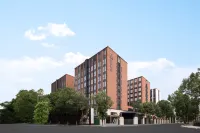 Golden Sail Street Yaduo Hotel, Jinhua Vocational College Отели рядом с достопримечательностью «Tiedian Cave Site Group»