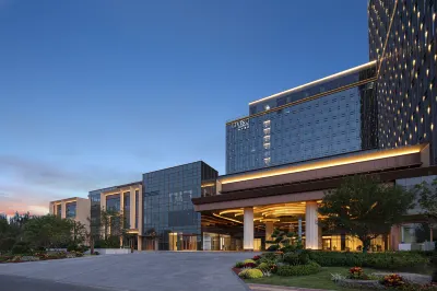 LIVING MINYOUN PERENNIAL TIANJIN(Tianjinnan Railway Station West Square) Hotel a Tianjin South Station/Huayuan Technology Industrial Park
