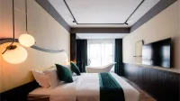 Pinko Residence (Guangzhou Panyu Aoyuan Plaza Store) Hotel berhampiran Chenyong Park