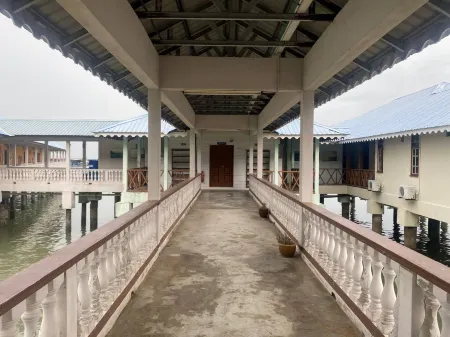 Capital O 91118 Chalet Seri Idaman Отели рядом с достопримечательностью «Penang War Museum»