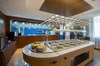 โรงแรมนานาชาติหยู่ติงหลานถิง - ที่มีที่จอดรถ