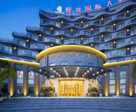Huanren Longxing International Hotel Отели рядом с достопримечательностью «Minzu Square»
