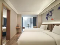 Kyriad Hotel (Xishuangbanna Jinghong Gaozhuang Starlight Night Market) Hotels in Jinghong