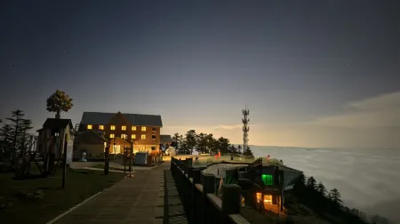 Shoufeng Bieyuan Отели рядом с достопримечательностью «Xiling Snow Mountain»