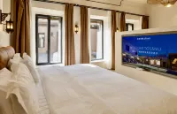 Xiyue Lodge Collection Homestay Hotels in Куча
