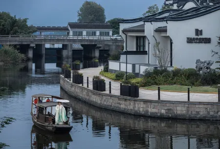 Xitang Wanda Moments Resort Hotel Отели рядом с достопримечательностью «Yongning Bridge»