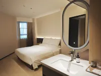 Orange Hotel (Wuzhou Municipal Plaza Branch) Hotels near Shizheng Square