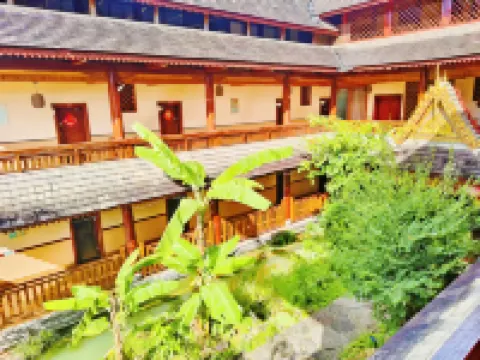 Cailun Jinwan Chinese Inn (Xishuangbanna Daizu Park Poshuiguangchang) Hotels near Xishuangbanna Dai Garden